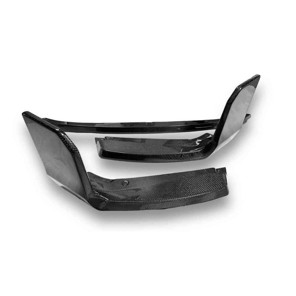 Carbon fiber M Style front lip for BMW M2 G87 by Palenon Performance, showcasing sleek, aerodynamic design on vehicle front.