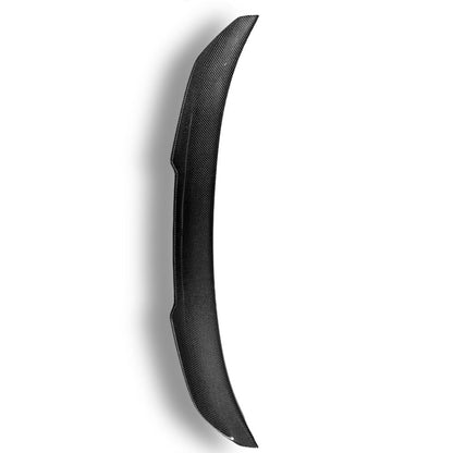 Carbon fiber BMW F80 M3 and F30 PSM trunk spoiler by Palenon Performance, showcasing sleek, aerodynamic design on a black car.