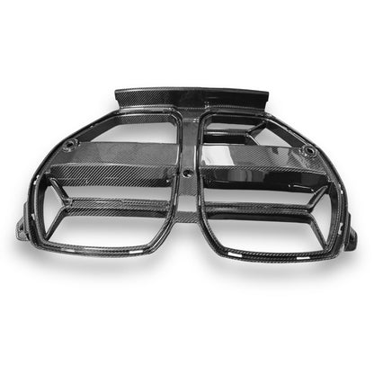 Carbon fiber kidney grille for BMW G80 M3 and G82 M4 from Palenon Performance, CSL style, with sleek, textured finish.