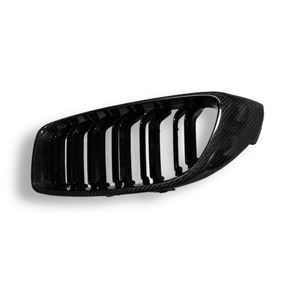 Carbon fiber grille for BMW F80 M3, F82 M4, F32 & F33 by Palenon Performance, showcasing sleek black textured design.