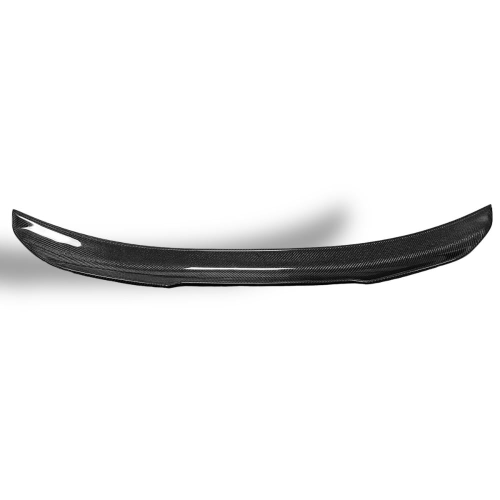 BMW E92 PSM trunk spoiler made of carbon fiber by Palenon Performance, showing the sleek, aerodynamic design on a white vehicle.