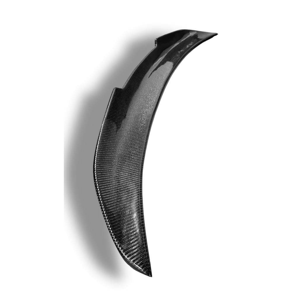 Carbon fiber BMW F10 PSM rear trunk spoiler by Palenon Performance, shown installed on the trunk of a BMW F10 vehicle.