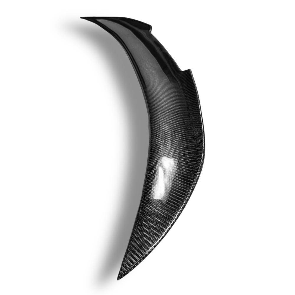 BMW E93 trunk spoiler in carbon fiber by Palenon Performance, showcasing a sleek, aerodynamic design on a black car.