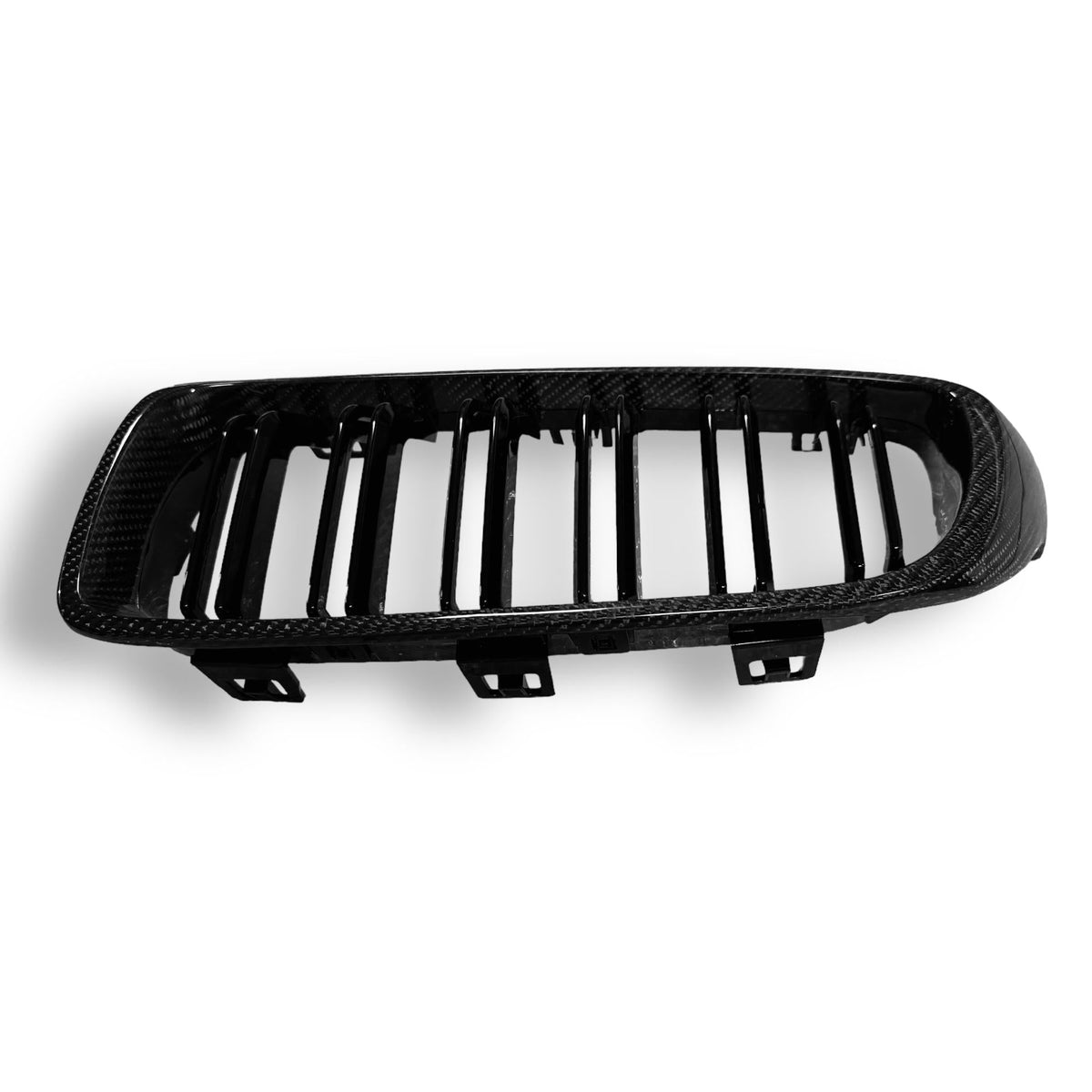 Carbon fiber grille for BMW F80 M3, F82 M4, F32, and F33 by Palenon Performance, showcasing the sleek black finish and detailed mesh design.