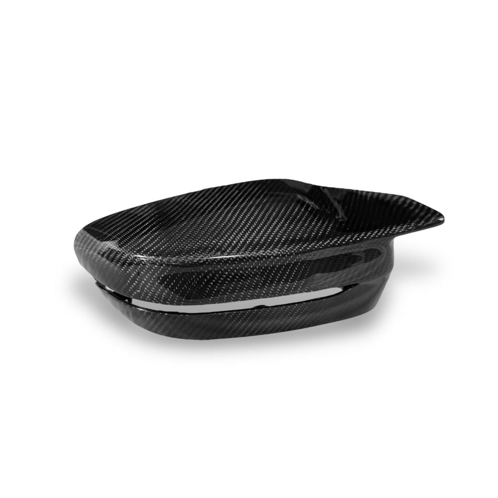 Carbon fiber mirror caps for BMW G80 M3 and G82/G83 M4, OEM style, by Palenon Performance, shown on vehicle with reflective finish.