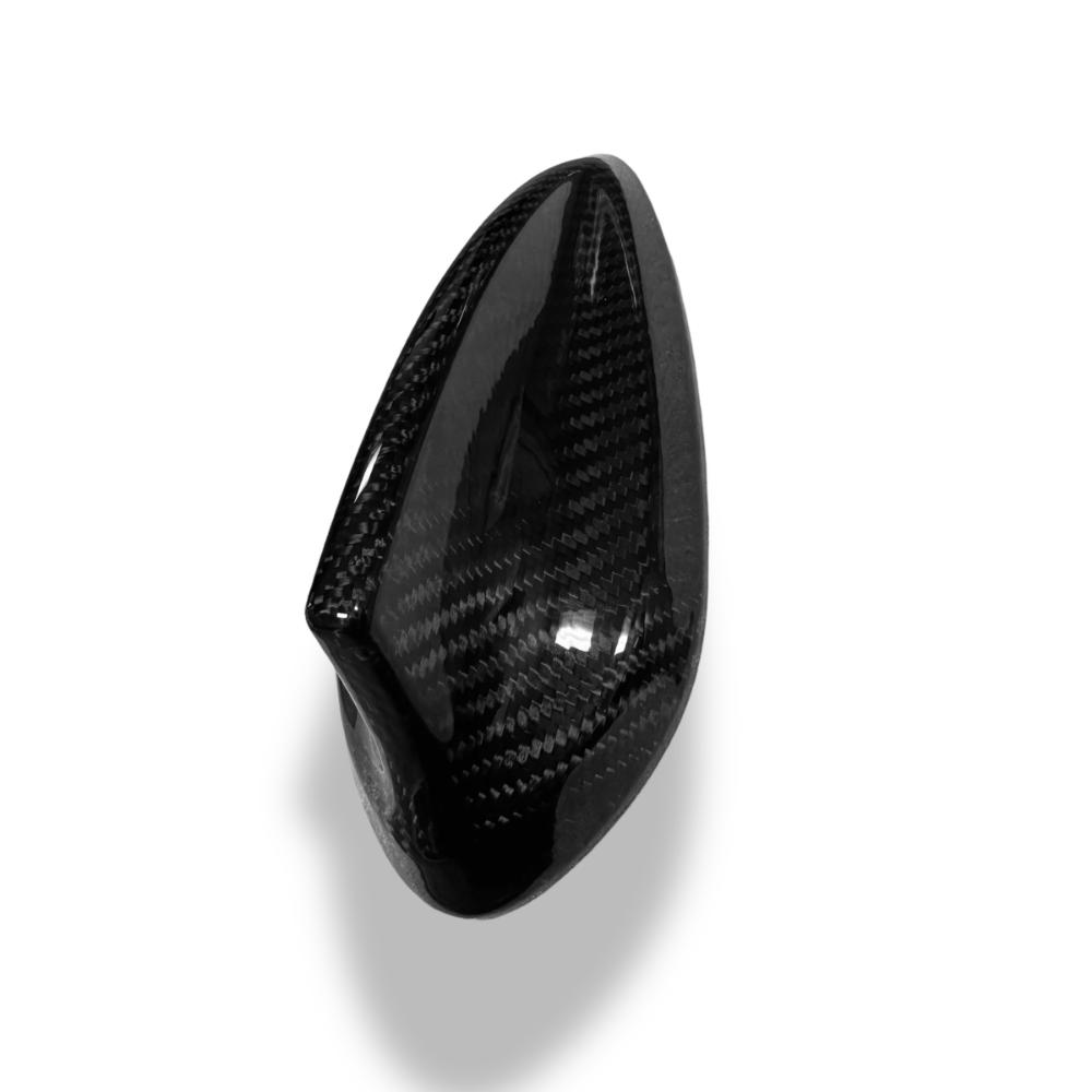 Carbon fiber roof antenna cover for BMW F20, F45, F15, F16, F85, F86, G01, E84 by Palenon Performance, shown on vehicle roof.