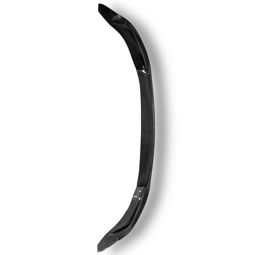 Carbon fiber Vorsteiner front lip for BMW F80 M3 and F82/F83 M4, showcasing sleek, textured carbon fiber design on a sporty vehicle.