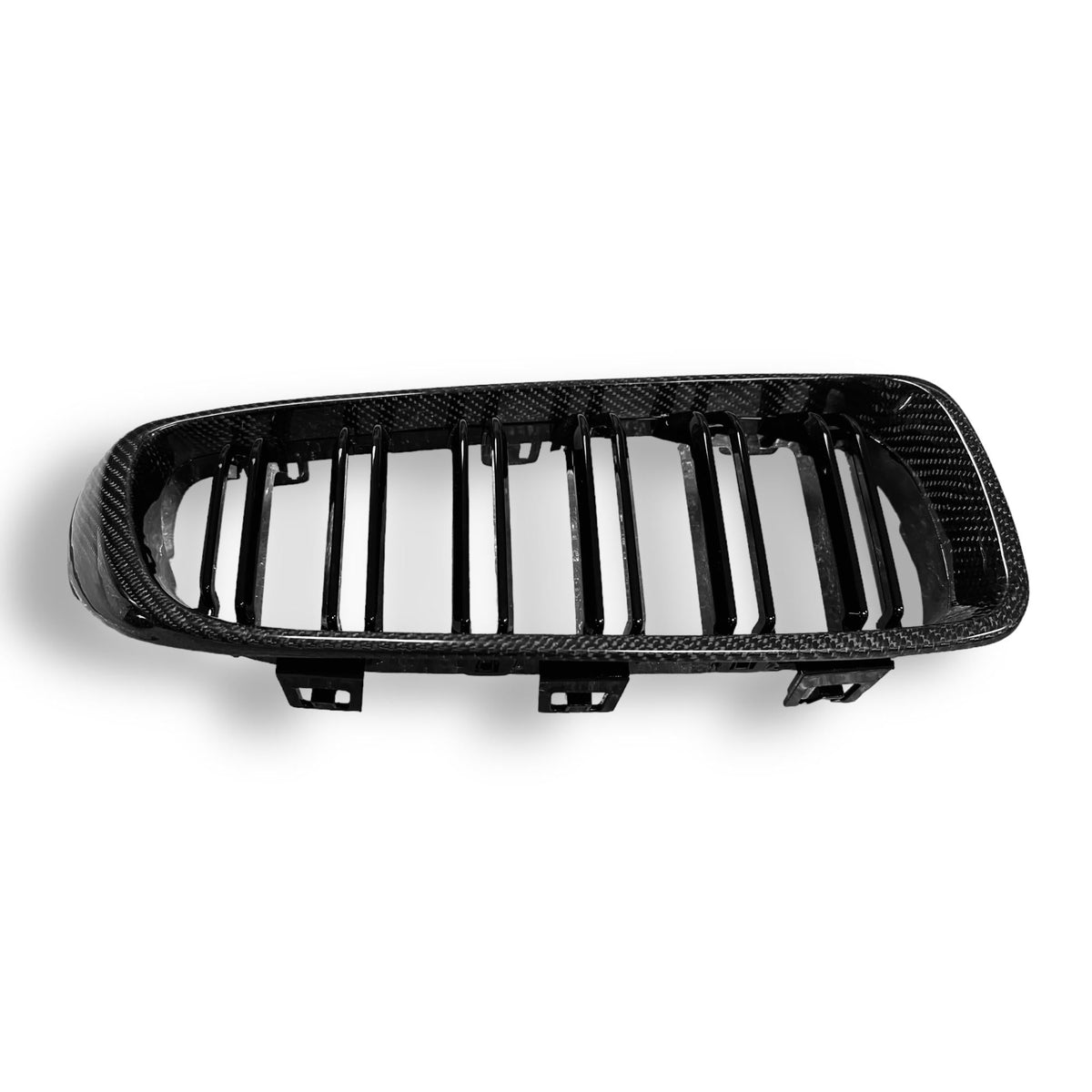 Carbon fiber grille from Palenon Performance for BMW F80 M3, F82 M4, F32 & F33, shown on a vehicle with a close-up view