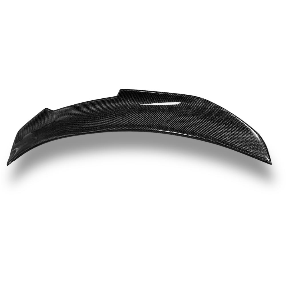 BMW E90 PSM trunk spoiler in carbon fiber for 325i, 328i, 335i models, showcasing a sleek, aerodynamic design.
