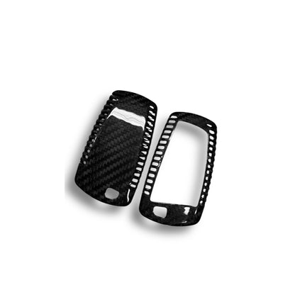 BMW X5, X6, X1 carbon fiber key cover by Palenon Performance, showing sleek black textured finish on a car key.