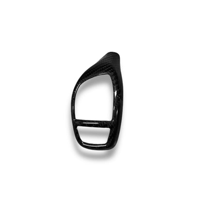 BMW F Series carbon fiber shift knob cover from Palenon Performance, showcasing sleek black carbon fiber with subtle branding detail.