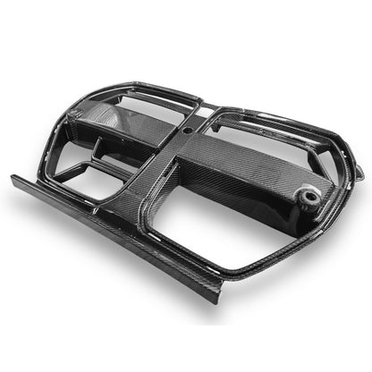 Carbon fiber kidney grille for BMW G80 M3 and G82 M4, CSL style, by Palenon Performance, shown on a black vehicle.