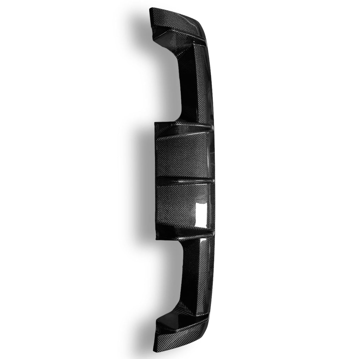 Carbon fiber rear diffuser for BMW G80 M3 and G82/G83 M4 by Palenon Performance, showcasing a sleek, aerodynamic design.
