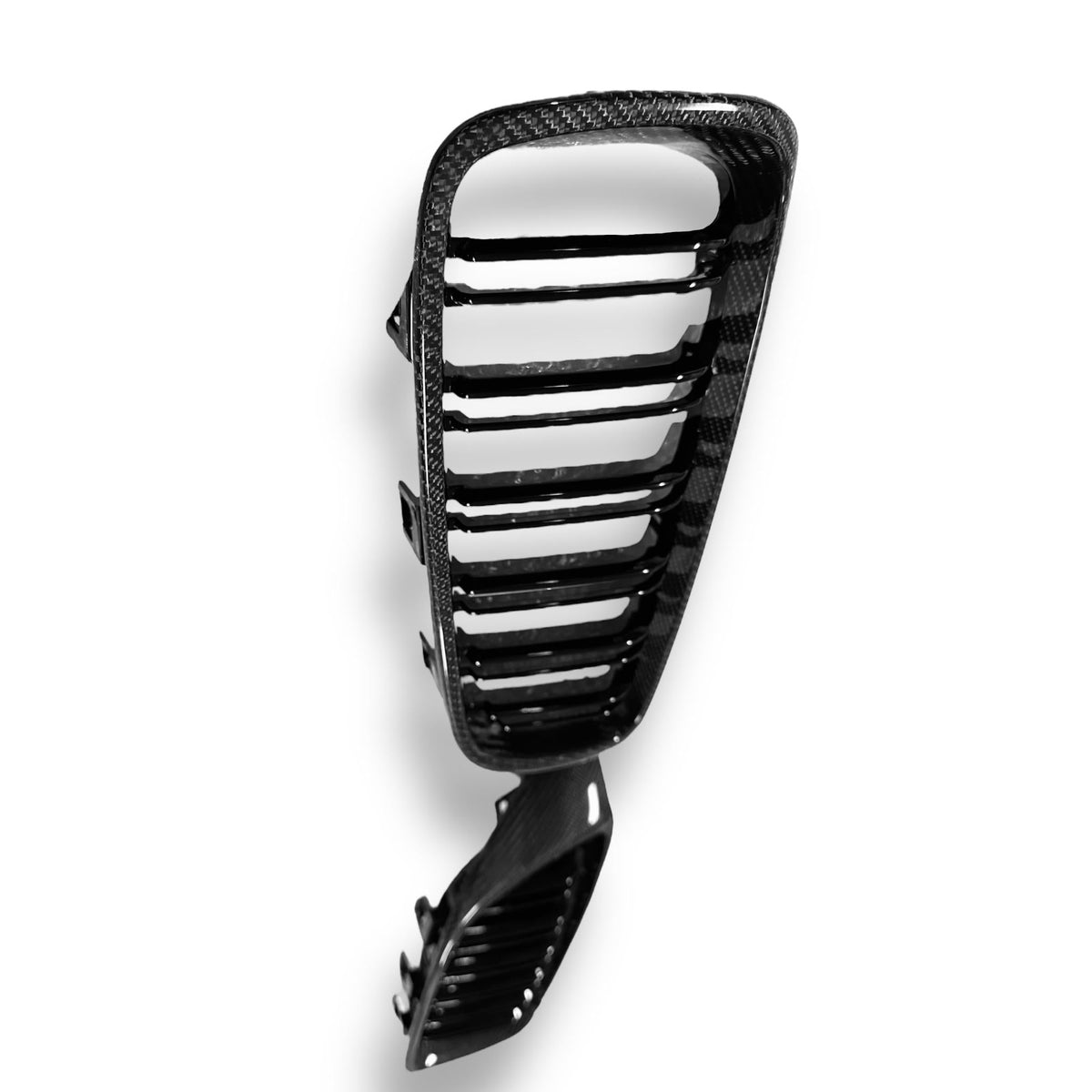 Carbon fiber grille for BMW F80 M3, F82 M4, F32, and F33 by Palenon Performance, showing close-up of sleek, textured CF design.