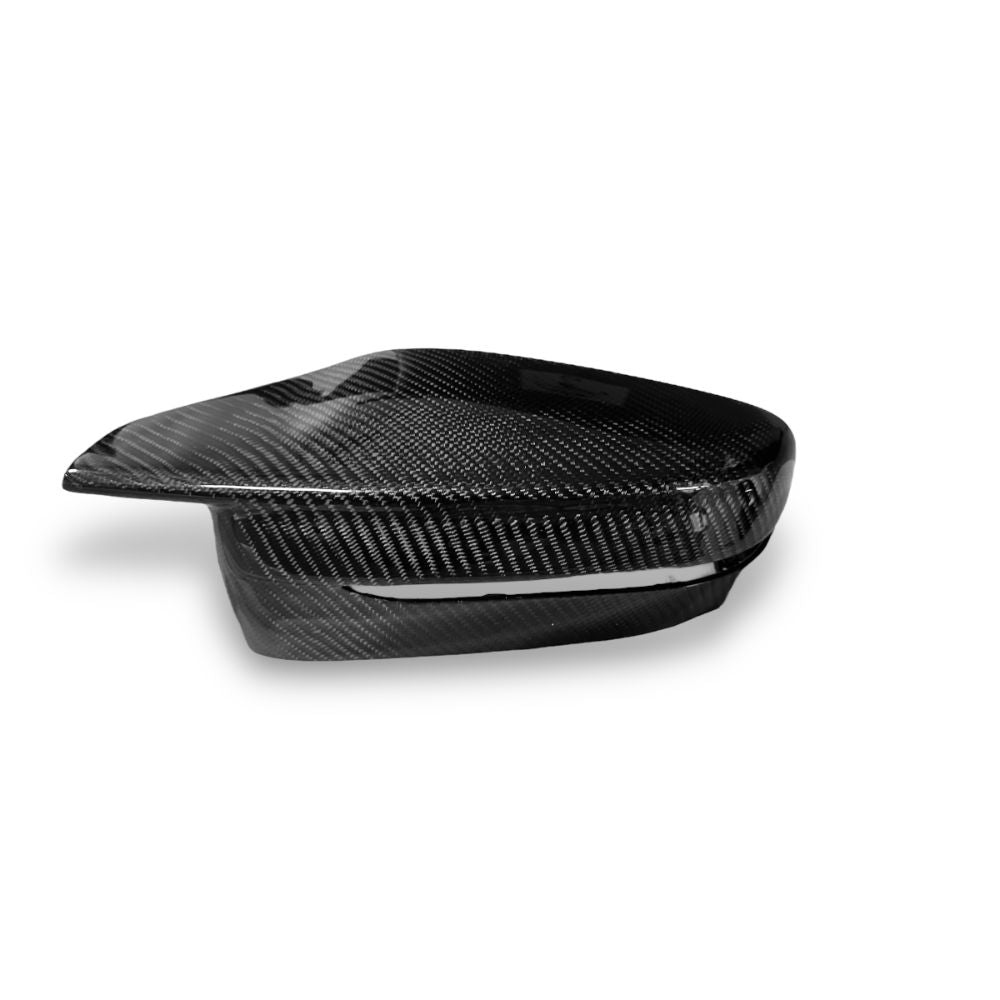 Carbon fiber mirror caps for BMW G80 M3 and G82/G83 M4, OEM style, by Palenon Performance, showing sleek, lightweight mirror covers.