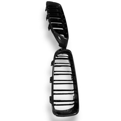 Carbon fiber grille for BMW F80 M3, F82 M4, F32, and F33 by Palenon Performance, featuring sleek black carbon fiber design.