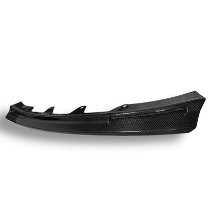 Carbon fiber V Style front lip for BMW G80 M3, G82 M4, G83 M4, by Palenon Performance, shown on a sleek vehicle.