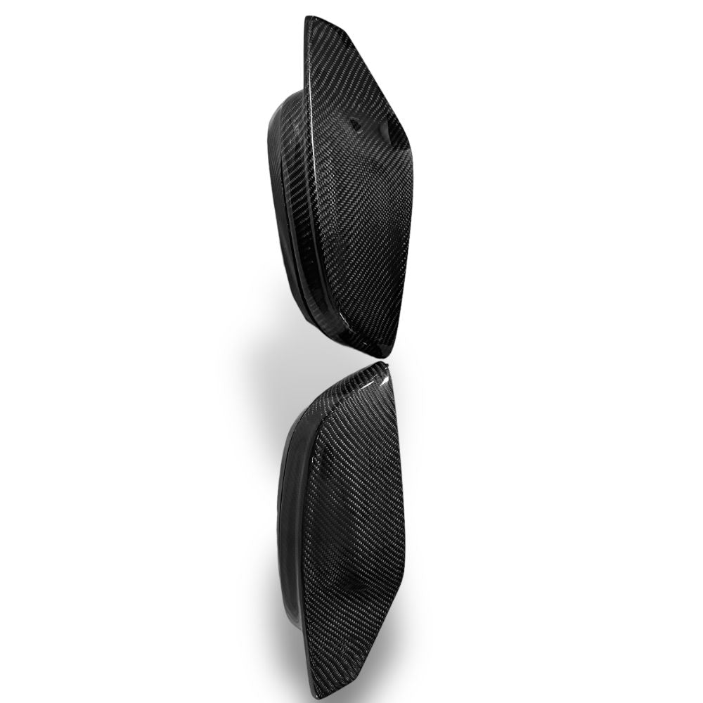 Carbon fiber mirror caps for BMW G80 M3 and G82/G83 M4, OEM style, by Palenon Performance, shown on vehicle side mirror.