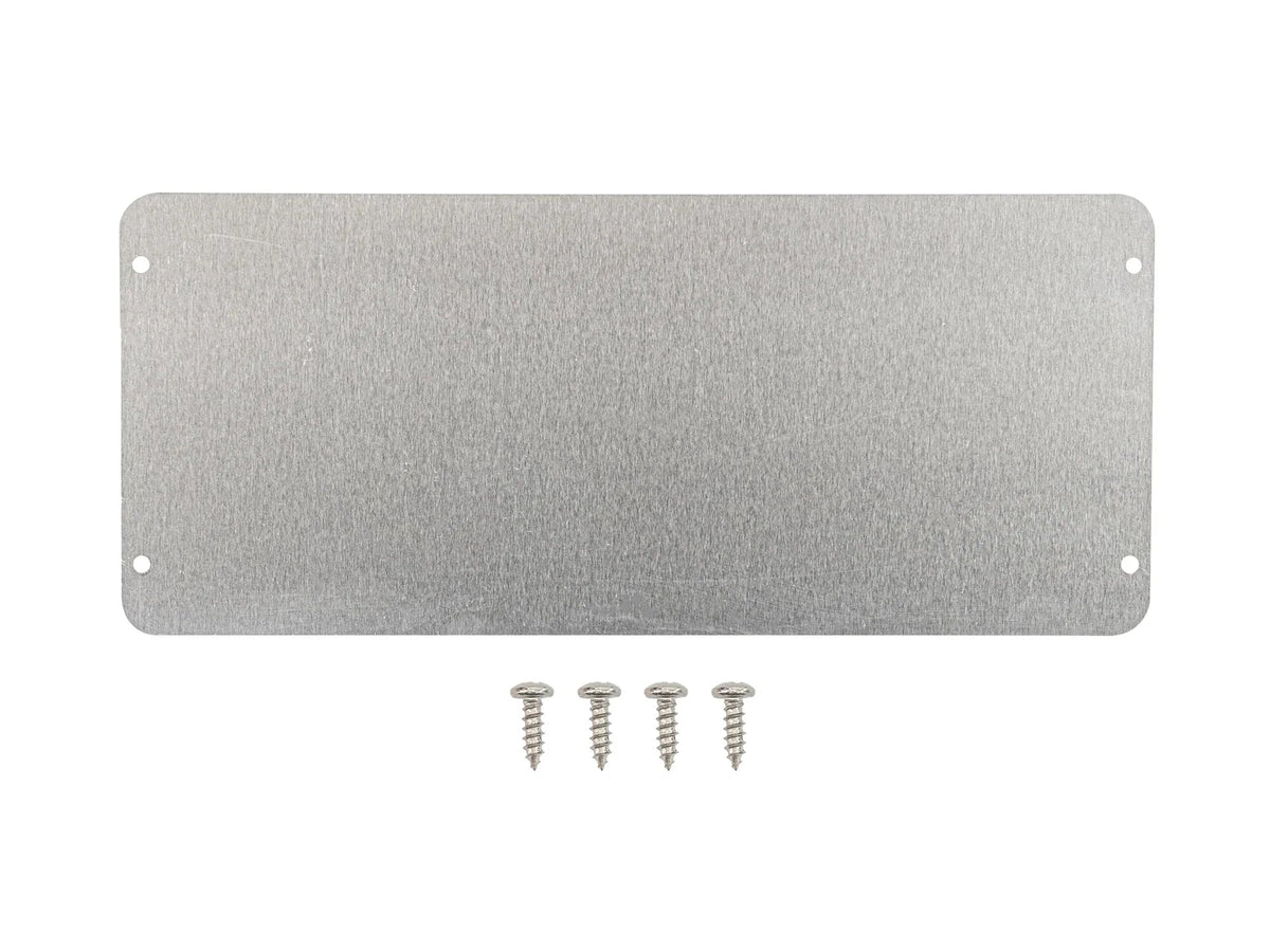 GoWesty rear heater vent block-off plate installed in Vanagon interior, covering rear heater vent opening.
