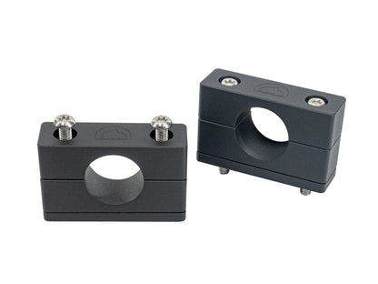 Pair of billet crossbar mounts for Vanagon Westfalia roof racks by GoWesty, shown on a vehicle roof for secure attachment.