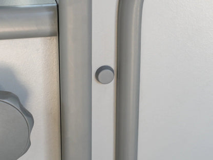 Set of five GoWesty interior screw caps for Vanagon, shown in a close-up image highlighting the plastic construction and fitting details.