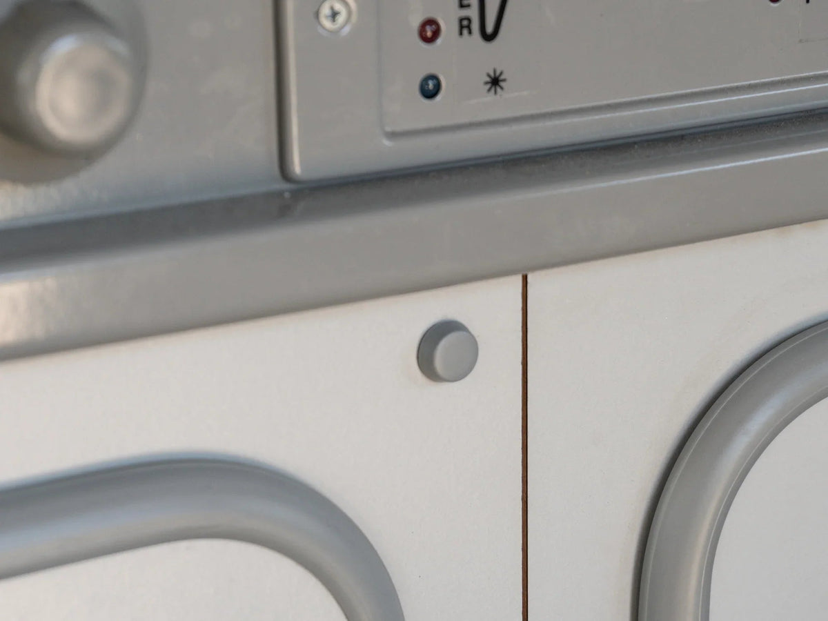 Set of five GoWesty interior screw caps for Vanagon, designed to cover and protect screw holes in vehicle interior panels.