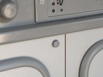 Set of five GoWesty interior screw caps for Vanagon, designed to cover and protect screw holes in vehicle interior panels.
