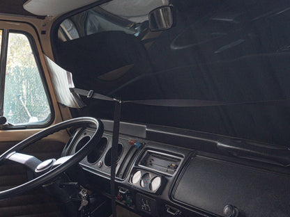 GoWesty Snow & Sun Shade for bus windows, interior view showing easy-to-install window cover for sun and snow protection.