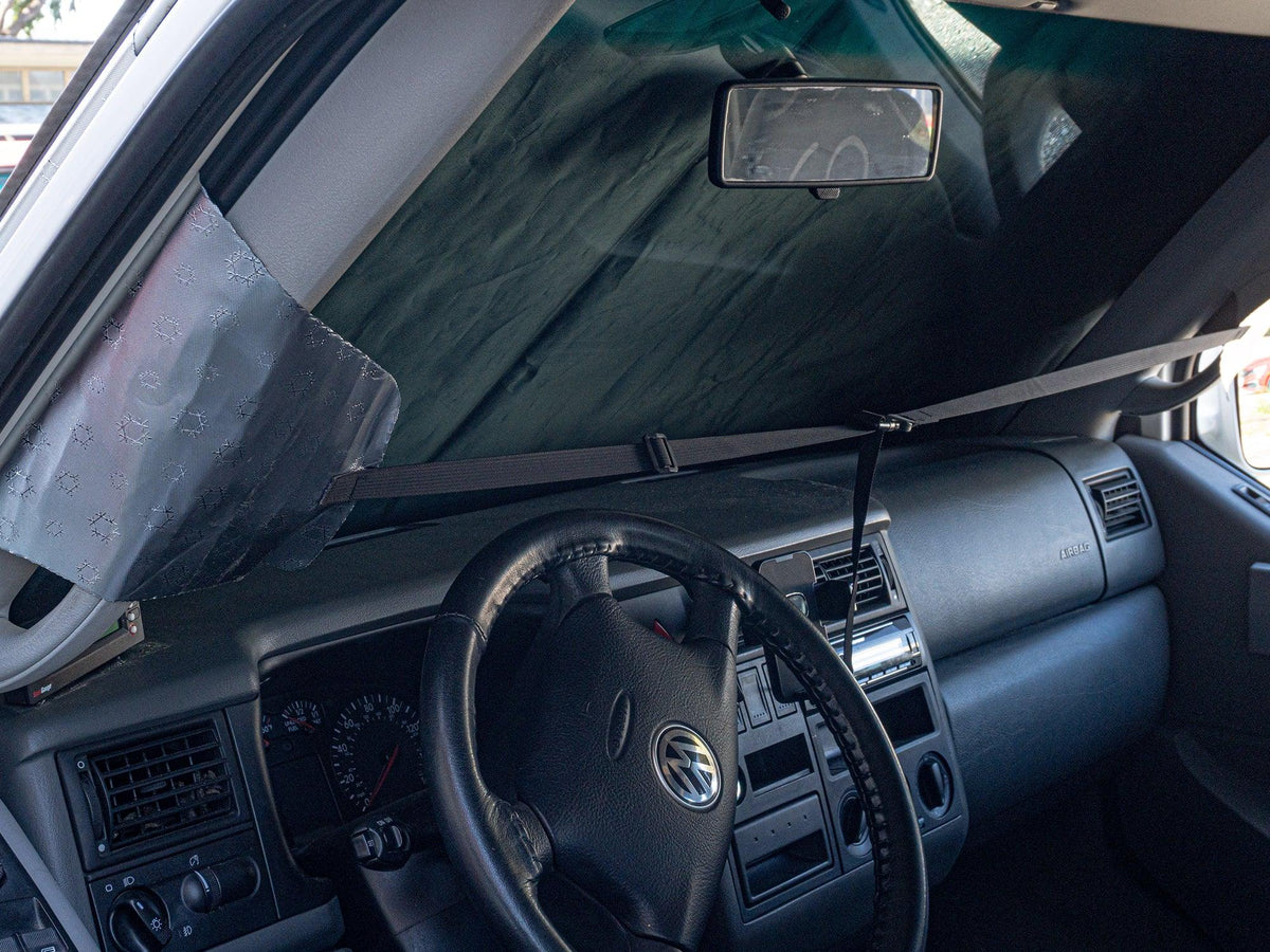 GoWesty Snow & Sun Shade for Eurovan window cover, showing a durable fabric cover blocking sunlight and cold for vehicle privacy.