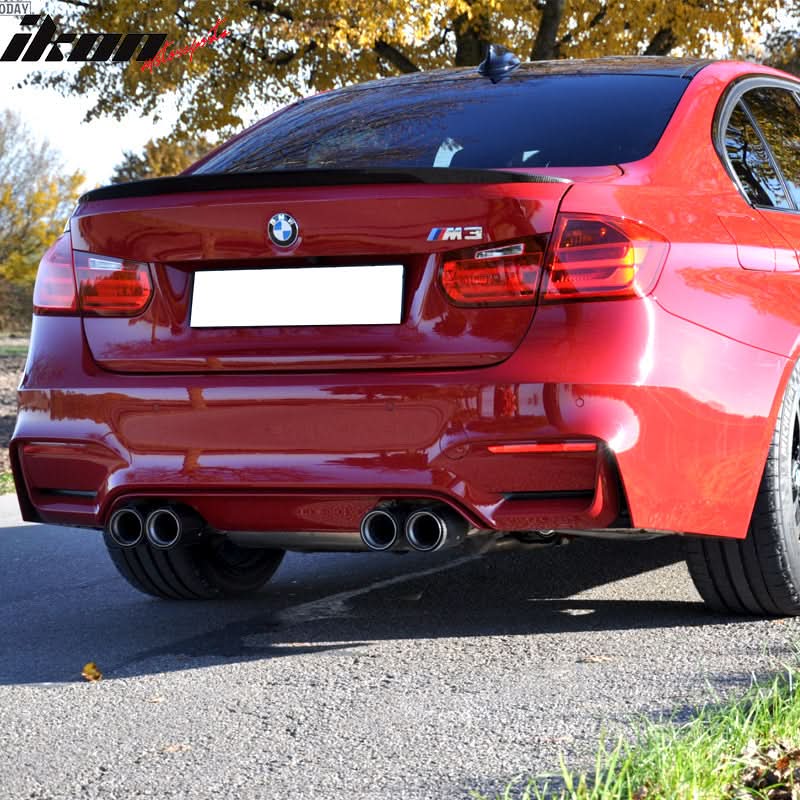 BMW F80 M3 sedan trunk spoiler wing in carbon fiber by K2 Industries, showing sleek aerodynamic design and glossy finish.