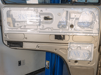 GoWesty Vanagon front door panel moisture barrier set, showing door panels and installation components.