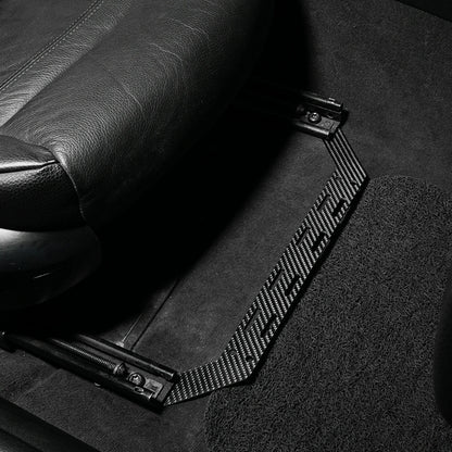 K2 Industries carbon fiber fire extinguisher seat mount bracket for BMW 3 Series E90 E91 E92 E93, 2005-2013, shown installed in vehicle.