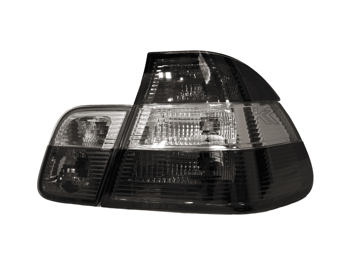 BMW 3 Series E46 sedan smoked tail lights by K2 Industries, showing a close-up of the dark-tinted rear light assembly.