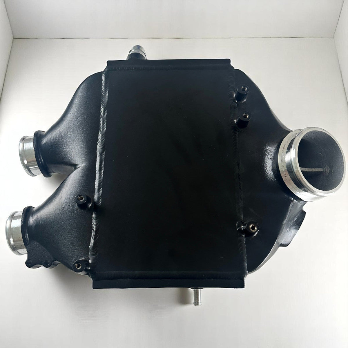 Premium Palenon Performance Top Mount S55 intercooler for BMW F80 M3, F87 M2, F82 M4, showing the sleek intercooler design.