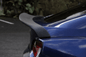 Black Hyper Duck Tail Trunk Spoiler for BMW Z4 E85/E86 by K2 Industries, showing the sleek spoiler on the car's trunk.