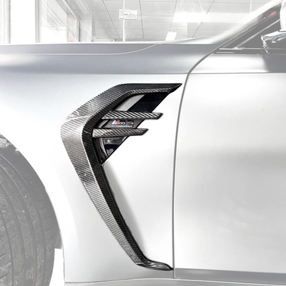 BMW 3/4 Series G80/G81/G82/G83 dry carbon fiber fender vents by K2 Industries, showcasing sleek, lightweight automotive aerodynamics.