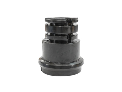 GoWesty front bump stop for Vanagon shock absorber, mounted on shock mount with logo visible, used for suspension support.