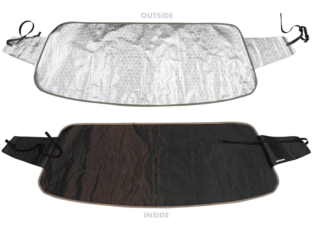 GoWesty Snow & Sun Shade for VW bus, window cover protecting against snow and sunlight, installed on bus windows.