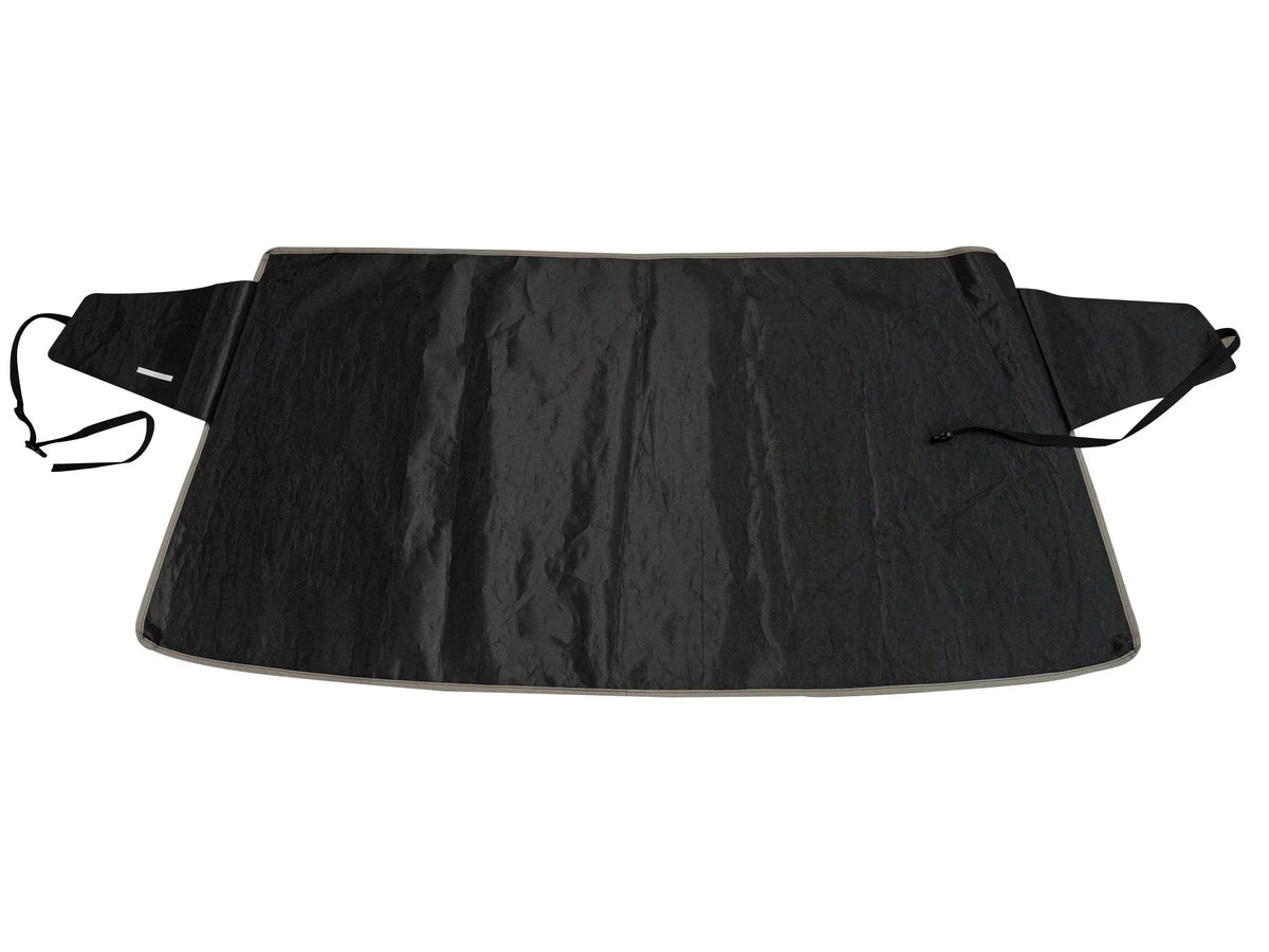 GoWesty Snow & Sun Shade window cover installed on VW Vanagon, offering sun protection and privacy for the vehicle's rear window.