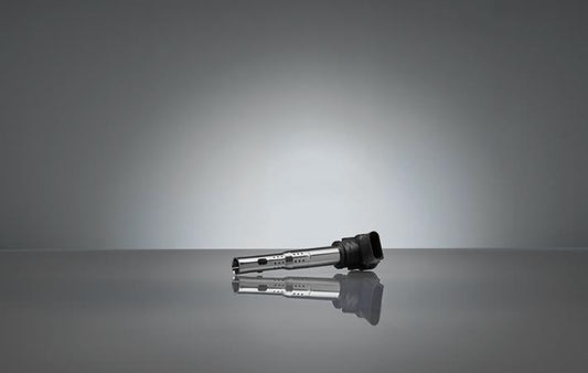Genuine OEM Audi VW 4.0L engine ignition coil, university brand, designed for 2013-2018 models, mounted on engine.