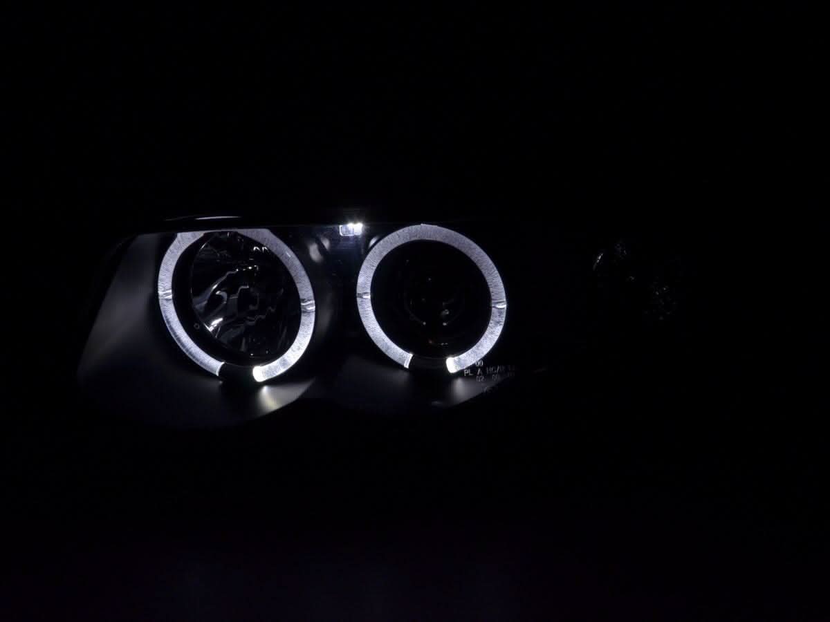 Black Angel Eye Headlight Set for Audi A4 B5 8D (1995-1999) by K2 Industries, featuring sleek dual halo lighting design.