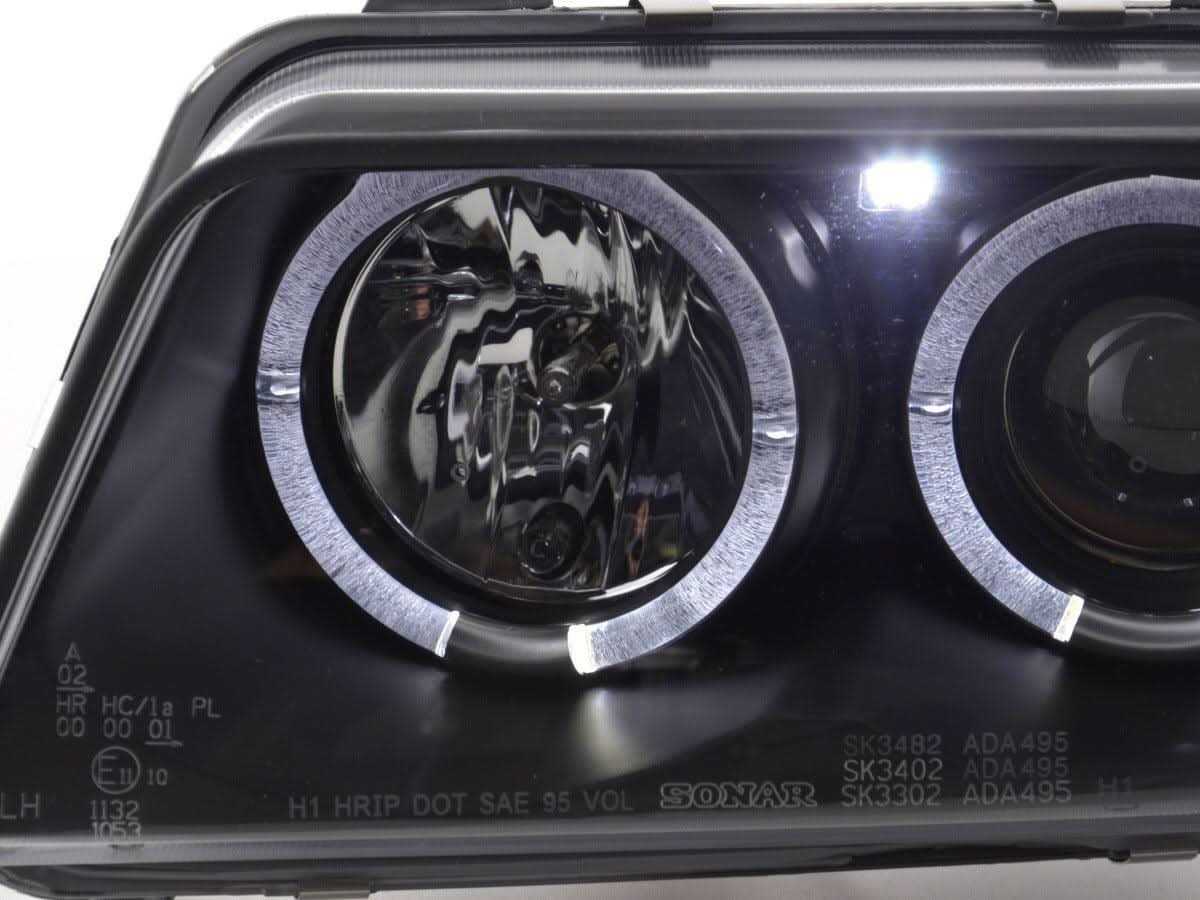Audi A4 B5 8D black angel eye headlights set by K2 Industries, front view showing sleek design for 1995-1999 models