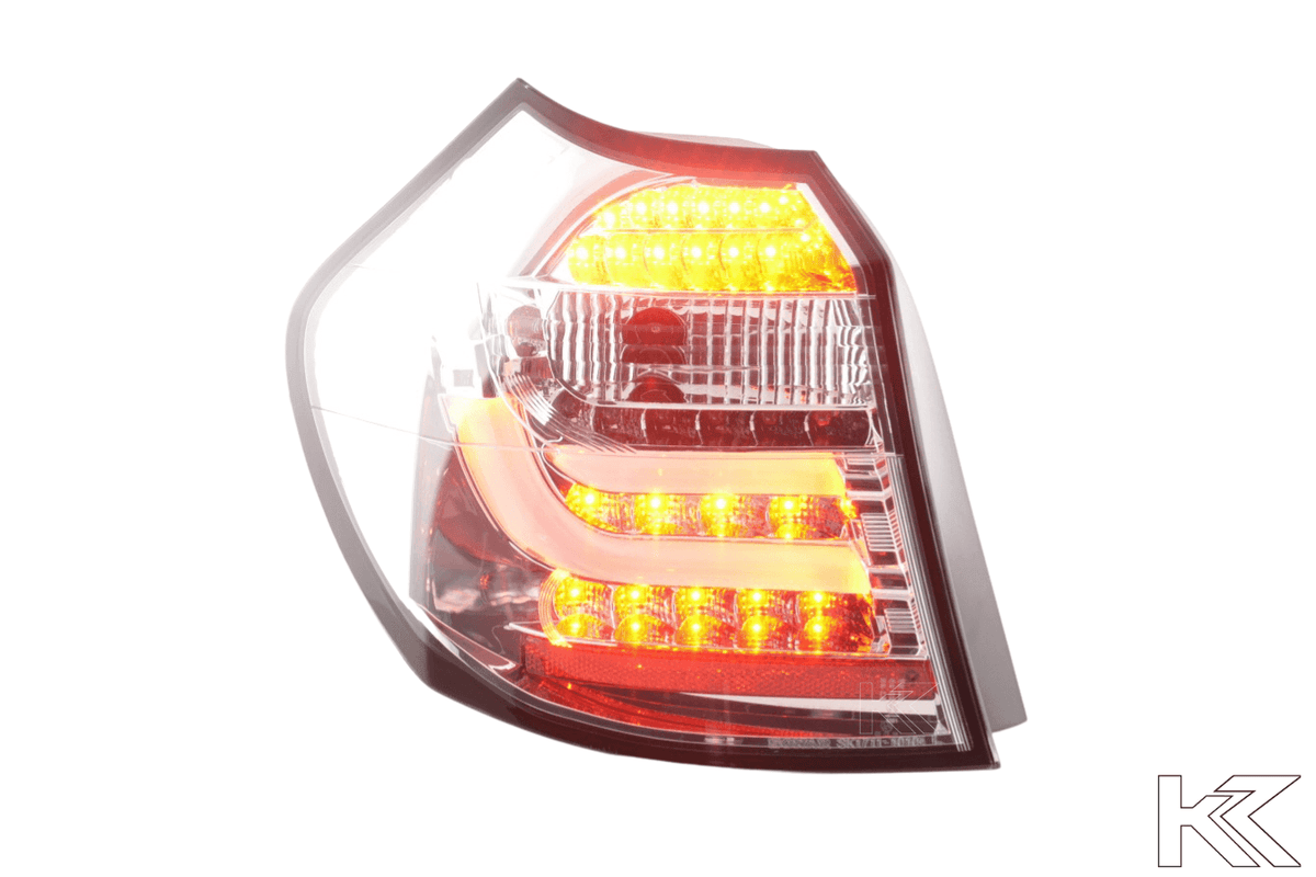 BMW 1-series E81 coupe chrome clear LED taillights set by K2 Industries, showing sleek design and bright LED illumination.
