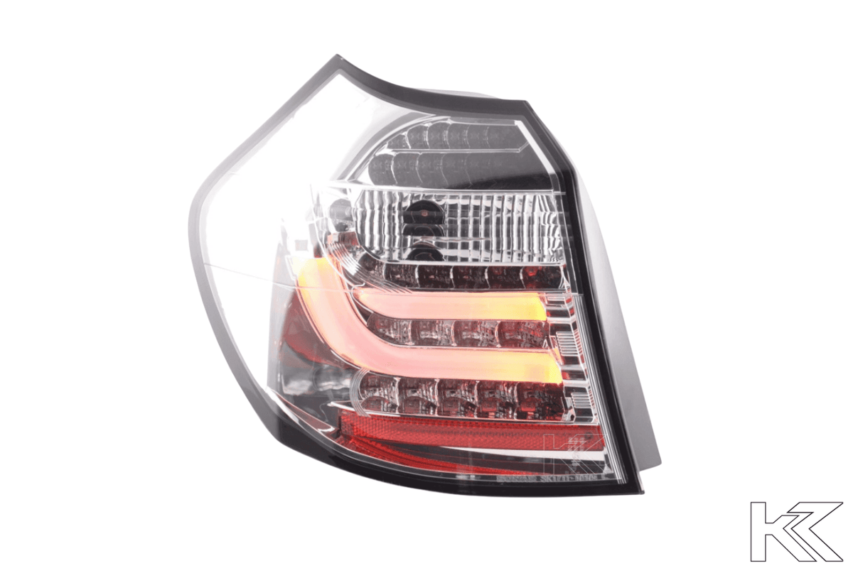 BMW 1-series E81 Coupe chrome clear LED tail lights set by K2 Industries, for models 2007-2011, showing the sleek rear lighting design.