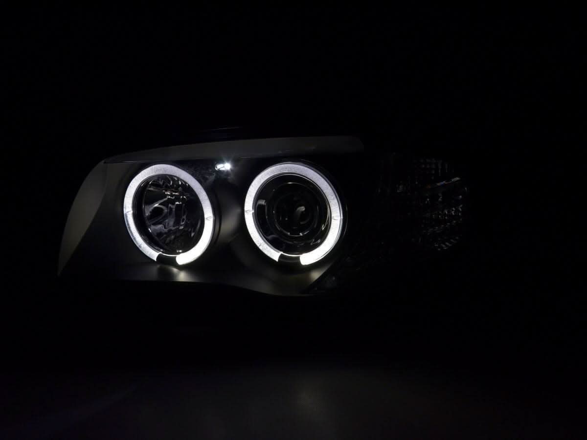 BMW 1-series E81 E82 E87 E88 black angel eyes headlight set by K2 Industries, for models 2004-2011, showing the headlights with angel eyes.