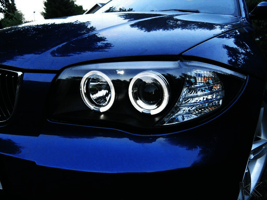 BMW 1-series E81 E82 E87 E88 headlight set with black angel eyes by K2 Industries, for 2004-2011 models.