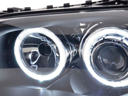 BMW 1-Series E81/E82/E87/E88 LED headlights with angel eyes by K2 Industries, showing sleek design and bright LED rings.