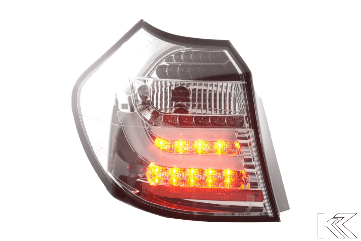 BMW 1 Series E87/E81 3/5-door chrome LED taillights by K2 Industries, showing the sleek design and clear LED lighting.
