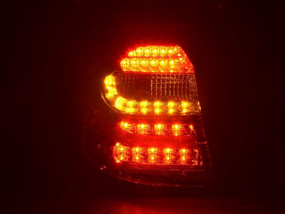 BMW 1 Series E87/E81 3/5-door red LED tail lights by K2 Industries, featuring sleek design and bright illumination for 2004-2006 models.