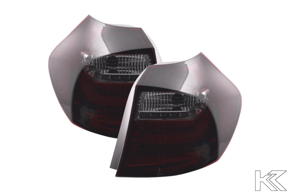 BMW 1 Series E87/E81 3/5-door red smoked LED tail lights by K2 Industries, for 2004-2007 models, showing sleek taillight design.